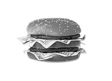 burger filled with money - hundred dollar bills